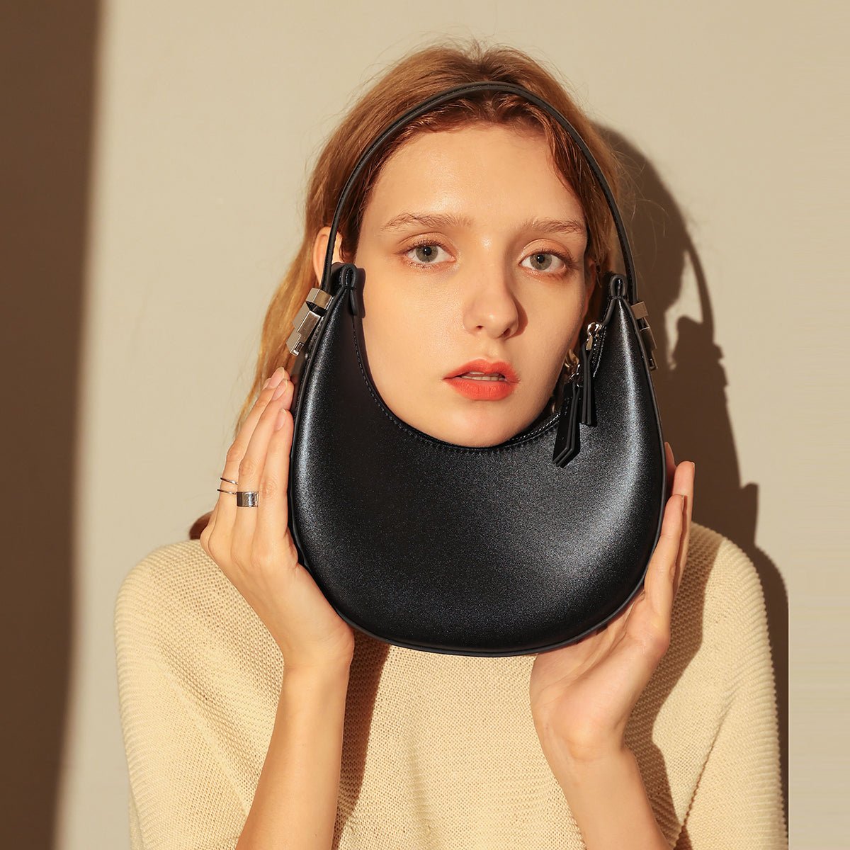 Structured Black Leather Crescent Moon Shoulder Bag – Smooth Grain Dumpling Hobo with Geometric Hardware